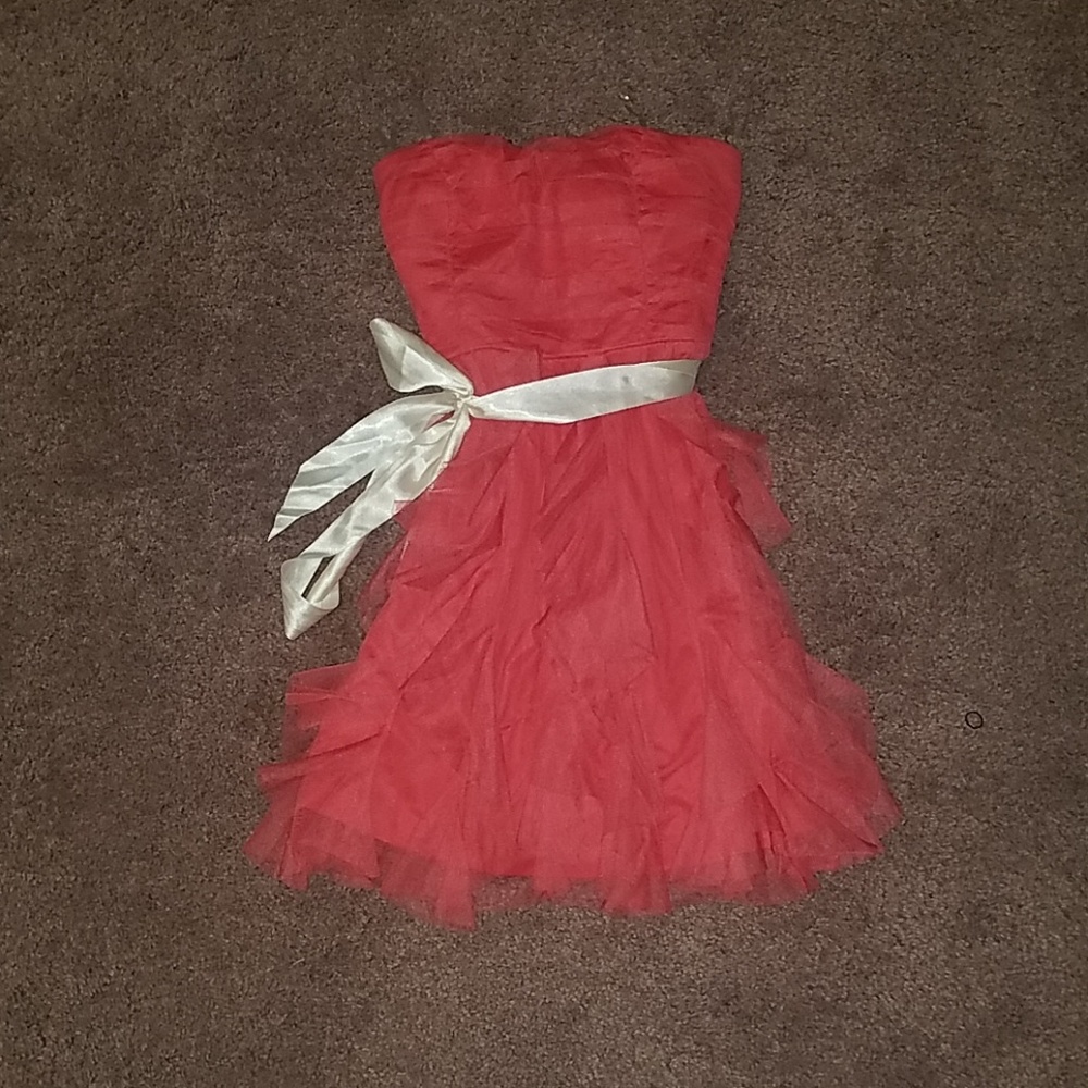 Pink dress with white white ribbon